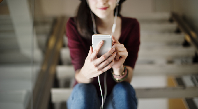 Woman playing on phone