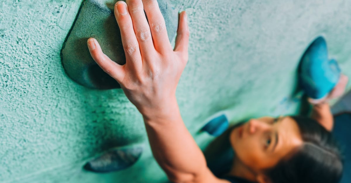woman-climbing-wall